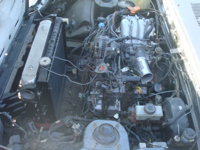 1984 charcoal gray Mazda RX-7 Coupe