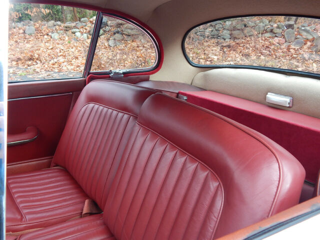 1960 Cream Jaguar XK Coupe