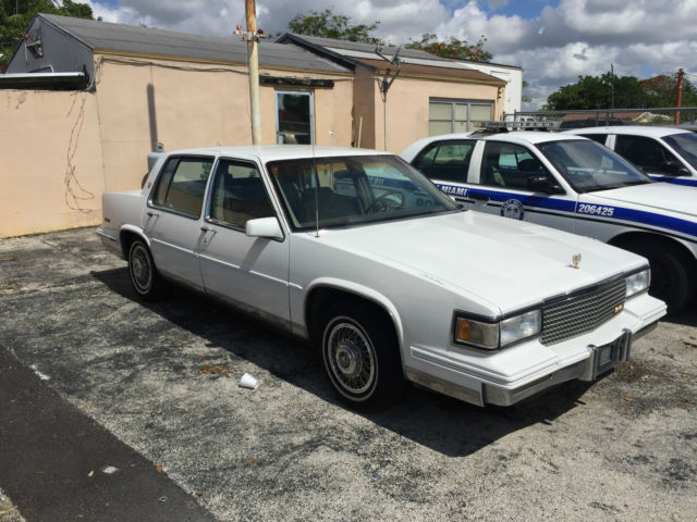 1988 White Cadillac DeVille