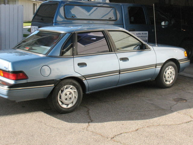 1991 Blue Ford Tempo 4 Door