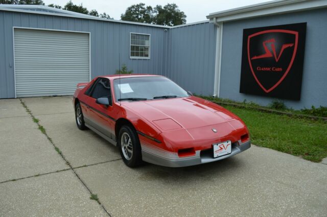 1985 Red Pontiac Fiero Coupe