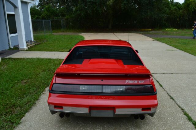 1985 Red Pontiac Fiero Coupe