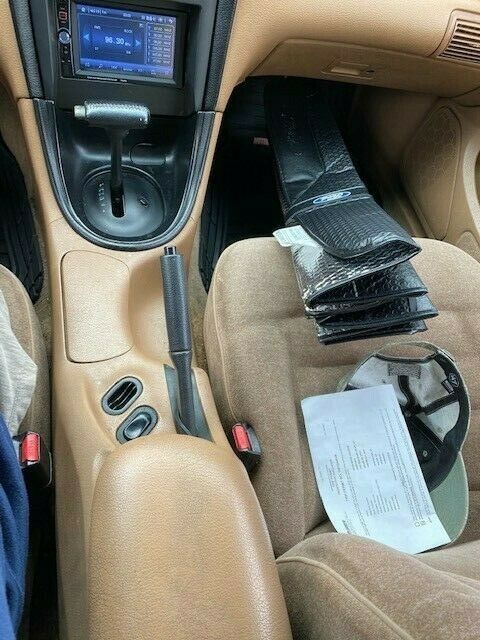 1994 Burgundy Ford Mustang Convertible