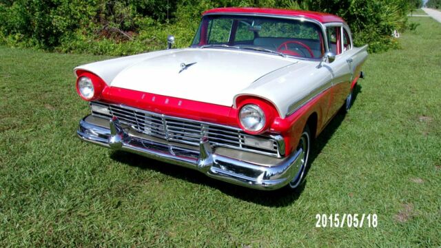 1957 red and white Ford Fairlane Coupe