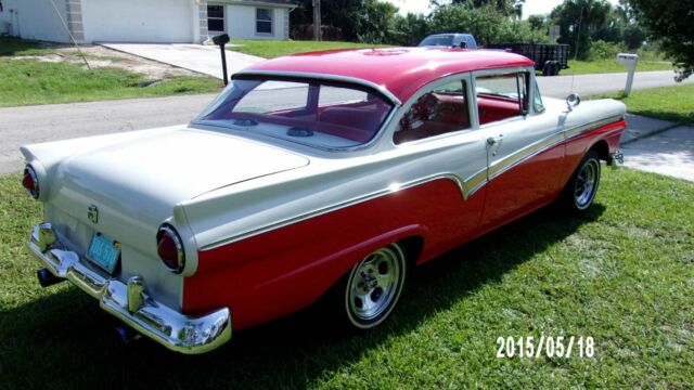 1957 red and white Ford Fairlane Coupe