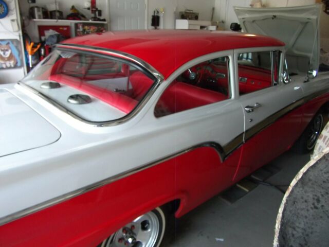 1957 red and white Ford Fairlane Coupe
