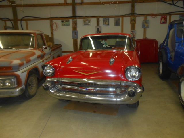 1957 red Chevrolet Bel Air/150/210 2dr ht