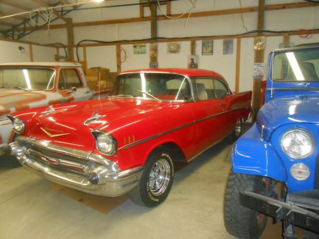 1957 red Chevrolet Bel Air/150/210 2dr ht