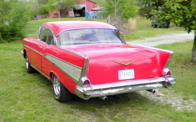 1957 red Chevrolet Bel Air/150/210 2dr ht
