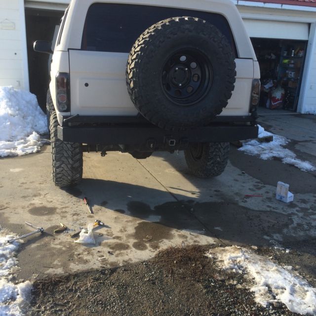 1993 tan bedlined Ford Bronco Convertible