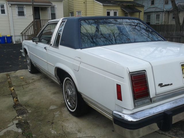 1986 White Ford Crown Victoria Coupe