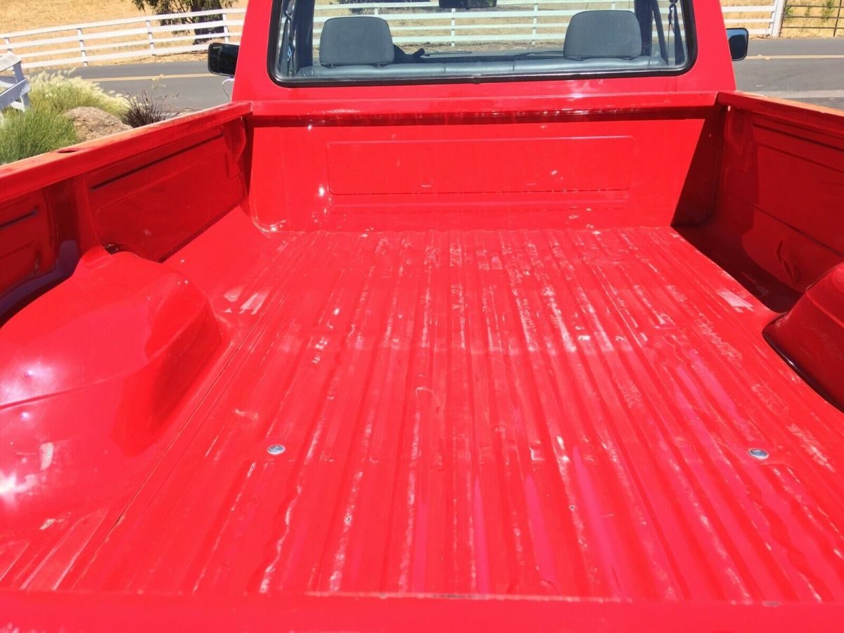1992 Red Ford F-250 Standard Cab Pickup