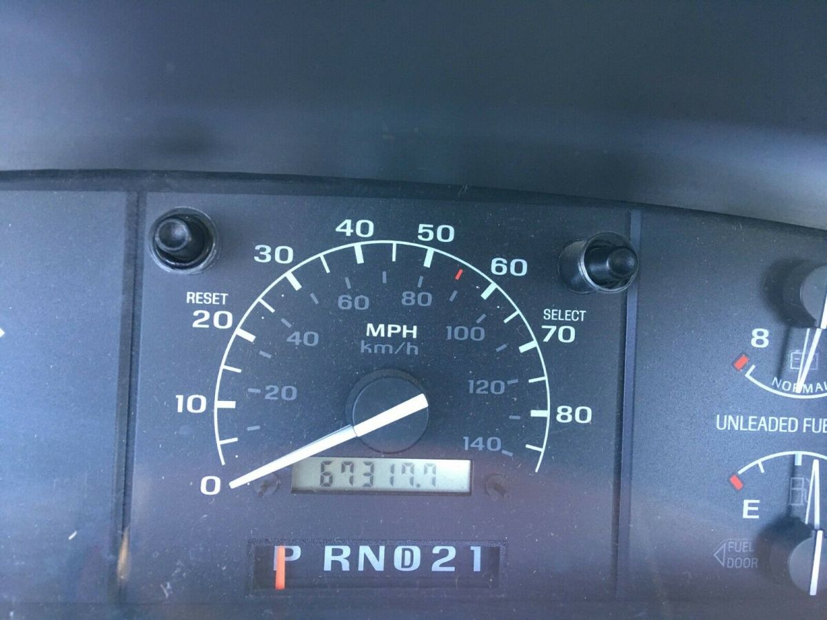 1992 Red Ford F-250 Standard Cab Pickup