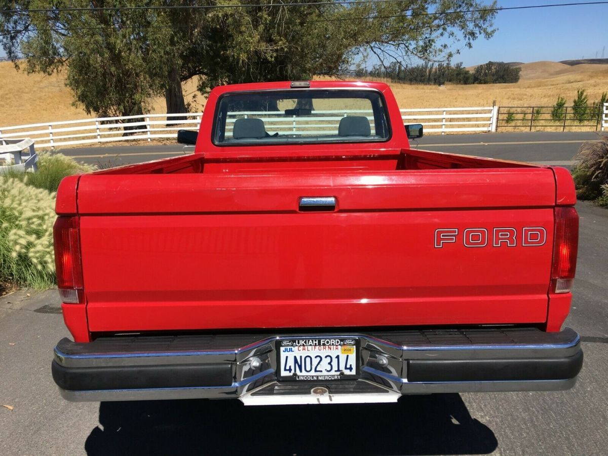 1992 Red Ford F-250 Standard Cab Pickup