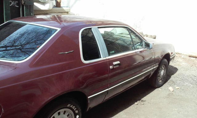 1986 Dark Marroon Ford Thunderbird Coupe