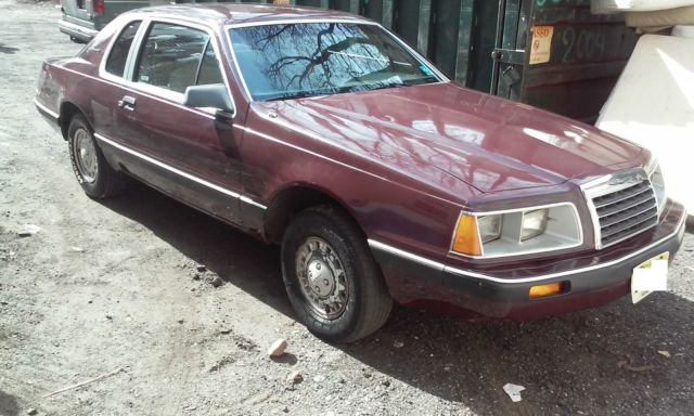 1986 Dark Marroon Ford Thunderbird Coupe