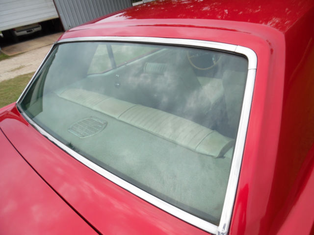 1965 Red Ford Mustang Sedan