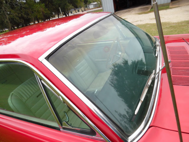 1965 Red Ford Mustang Sedan