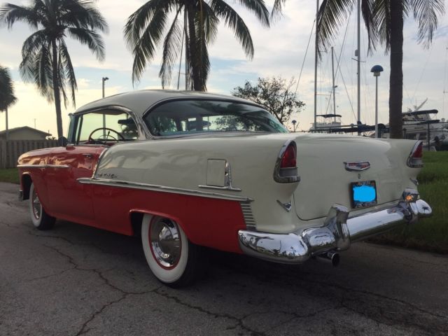1955 red/white Chevrolet Bel Air/150/210 coupe