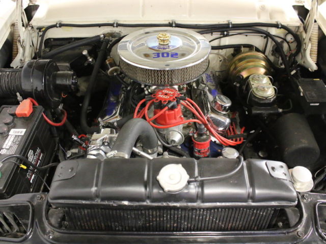 1956 Red Ford Fairlane Coupe