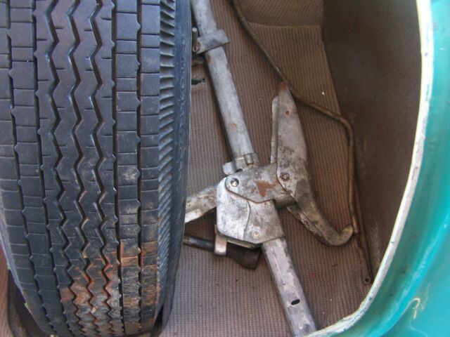 1956 green/white Oldsmobile Eighty-Eight four door sedan