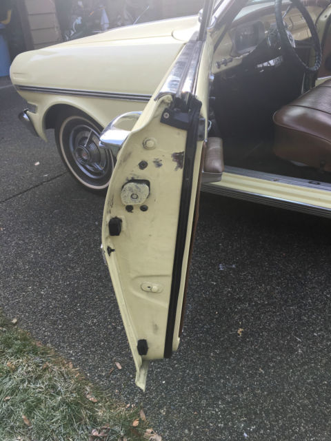 1963 yellow Chevrolet Nova 2 door convertible
