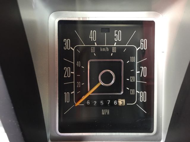 1978 Red and white Ford F-100 Standard Cab Pickup