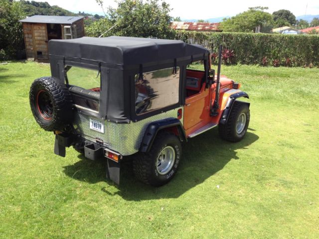1975 Orange Toyota FJ Cruiser SUV