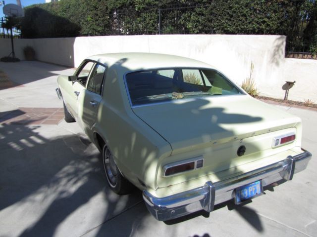1976 Yellow Ford Maverick 4 DOOR SEDAN