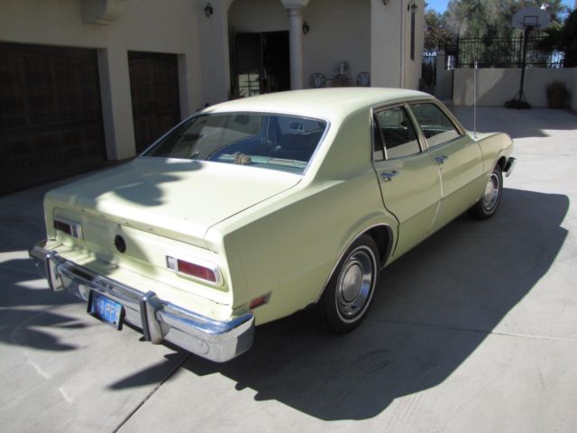 1976 Yellow Ford Maverick 4 DOOR SEDAN