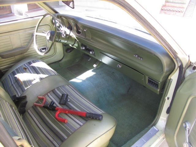 1976 Yellow Ford Maverick 4 DOOR SEDAN