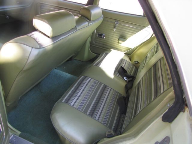 1976 Yellow Ford Maverick 4 DOOR SEDAN