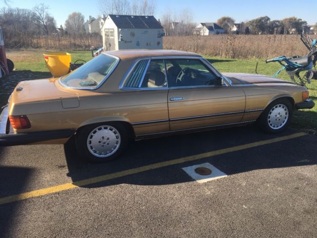 1977 Gold Mercedes-Benz SL-Class Coupe