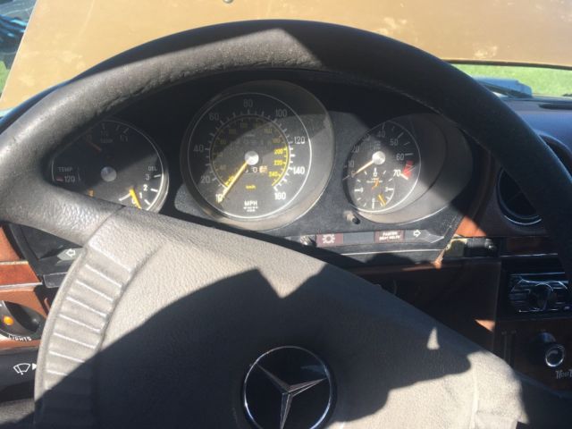 1977 Gold Mercedes-Benz SL-Class Coupe