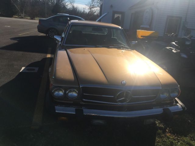 1977 Gold Mercedes-Benz SL-Class Coupe