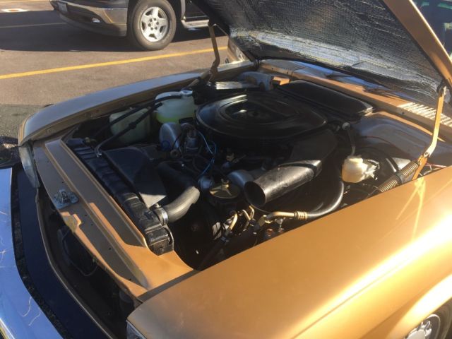 1977 Gold Mercedes-Benz SL-Class Coupe