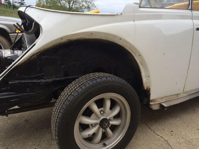 1971 red Volkswagen Beetle - Classic Convertible