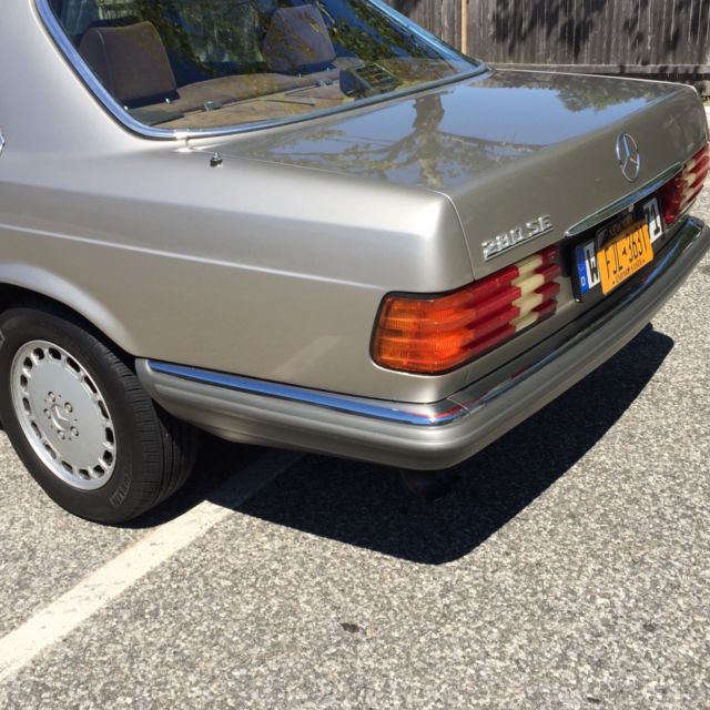 1980 Gold Mercedes-Benz 200-Series Sedan