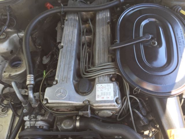 1980 Gold Mercedes-Benz 200-Series Sedan