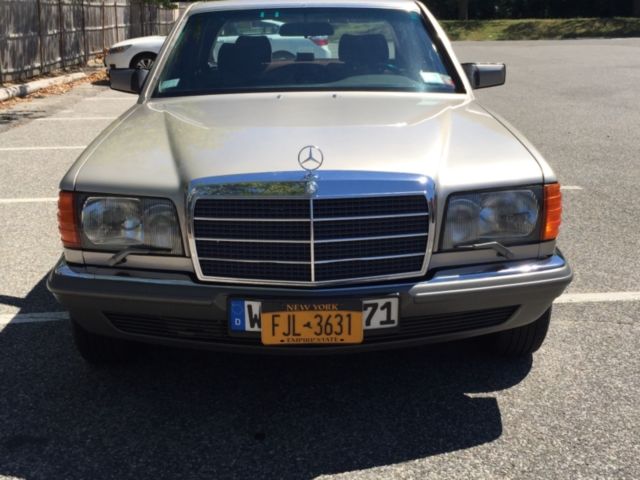 1980 Gold Mercedes-Benz 200-Series Sedan
