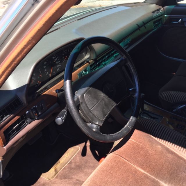 1980 Gold Mercedes-Benz 200-Series Sedan