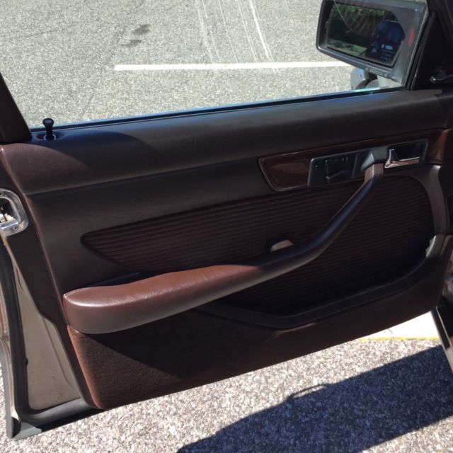 1980 Gold Mercedes-Benz 200-Series Sedan