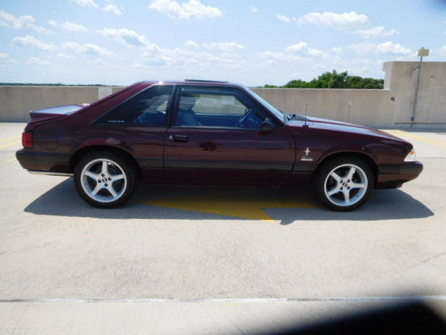 1989 Burgundy Ford Mustang Hatchback