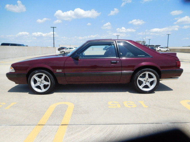 1989 Burgundy Ford Mustang Hatchback