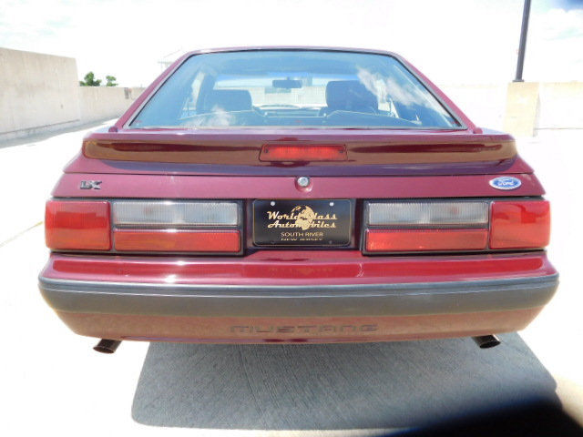 1989 Burgundy Ford Mustang Hatchback