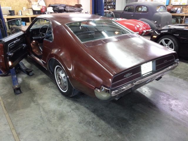 1966 Dark Ginger Oldsmobile Toronado Coupe