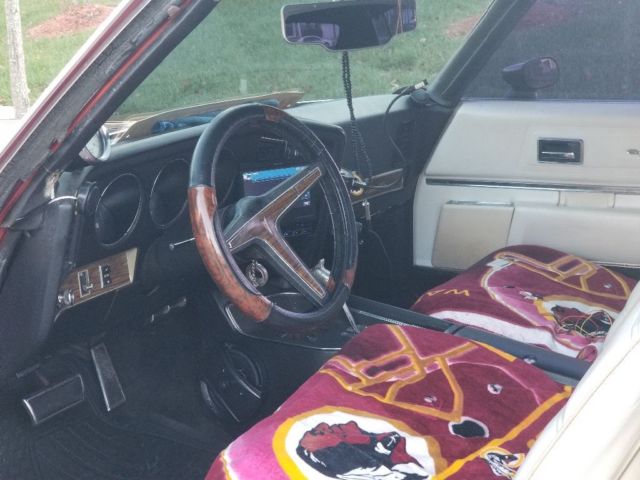 1972 Burgundy Pontiac Grand Prix Coupe