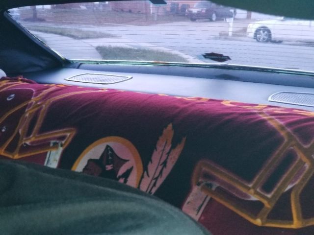 1972 Burgundy Pontiac Grand Prix Coupe