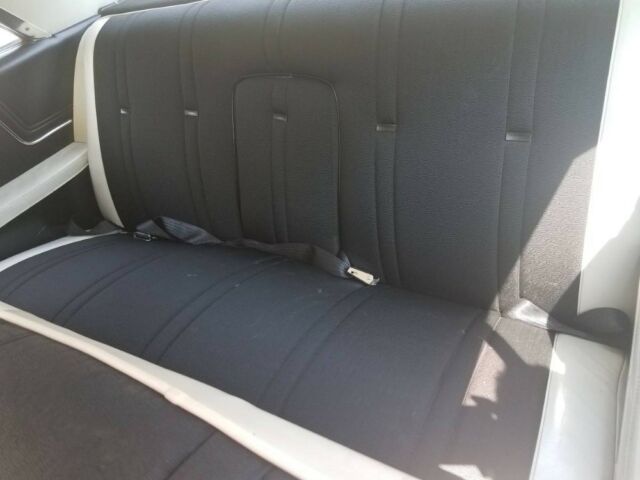 1962 White Cadillac DeVille Coupe