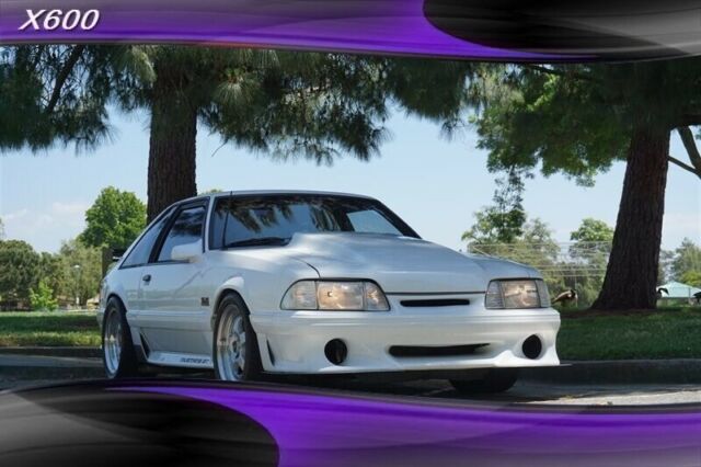 1989 White Ford Mustang --